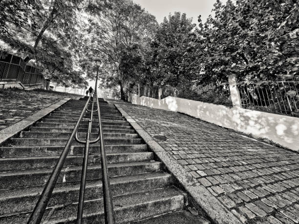 One of the many classic steep stairways in the Montmartre district in Paris France