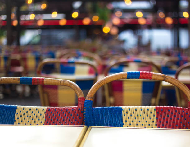 istock Paris, France: Patriotic Sidewalk Cafe with Retro Wicker Chairs 2153887905