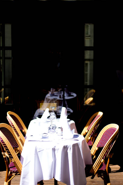 istock Paris, France:  Elegant Sidewalk Cafe, Retro Wicker Chairs 2153890399