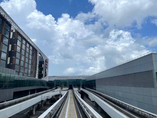 istock Changi airport, Singapore 05192024: Sky train track between terminal 2153891442