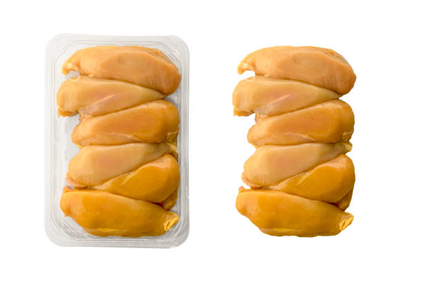 Chicken fillet and plasic package isolated on white background