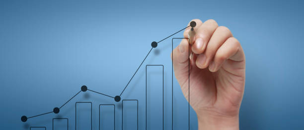 istock Male hand drawing graph chart showing business profit 2153903017