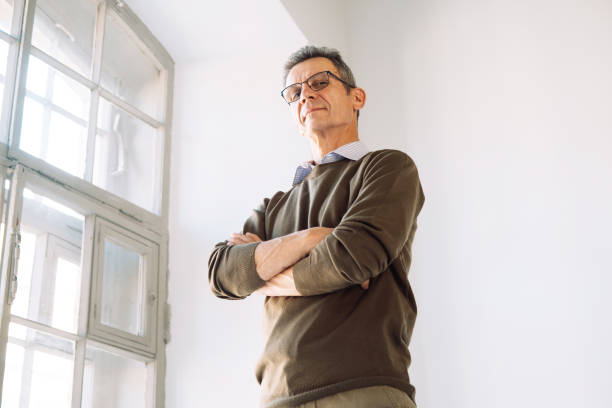 istock Portrait elderly man at home. Elderly Man Face Expression Concept. 2153903553