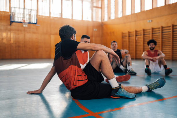 istock Basketball player warming up before training in a sports hall 2153906938