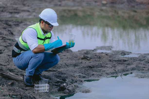 istock Environmental engineers work at wastewater treatment plants,Water supply engineering working at Water recycling plant for reuse 2153907351