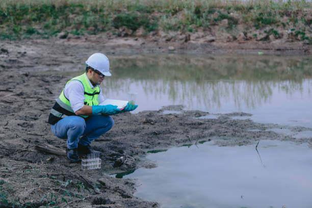 istock Environmental engineers work at wastewater treatment plants,Water supply engineering working at Water recycling plant for reuse 2153907353