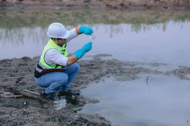 istock Asian Man experts analyze the water in a contaminated , environment ecology concept 2153907360