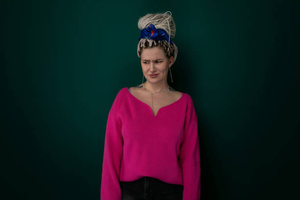 istock Woman Wearing Pink Sweater With Blue Bow on Her Head 2153908851