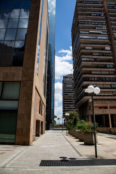istock Naples skyscrapers daytime with clouds reflections 2153911641