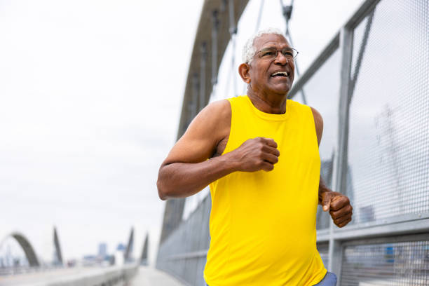istock Senior black man working out in the city 2153911912