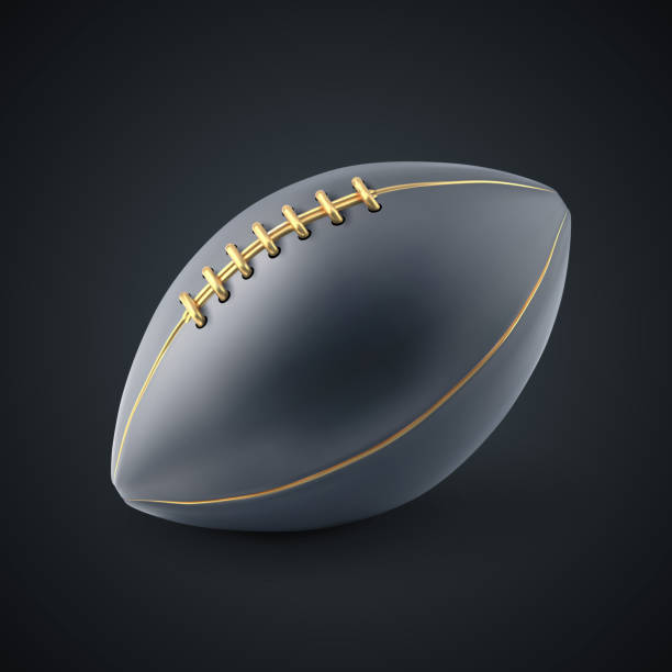 istock Black and gold american football ball 2153911950