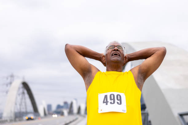 istock Senior black man exhausted working out in the city 2153912015