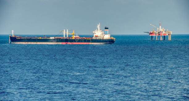 istock FPSO ship and drilling rig in offshore oil field 2153913643