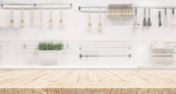 istock Selective focus.End grain wood counter,table top on blur kitchen counter in morning background.For montage product display o 2153914788