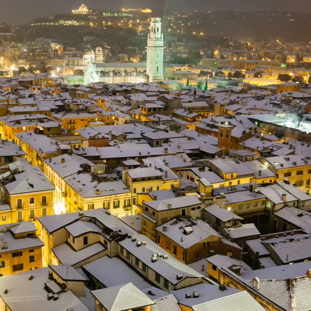 Snow covered roofs in the old town of Verona, one of the most popular and visited cities in Veneto, whose historic centre has been declared a Unesco World Heritage Site