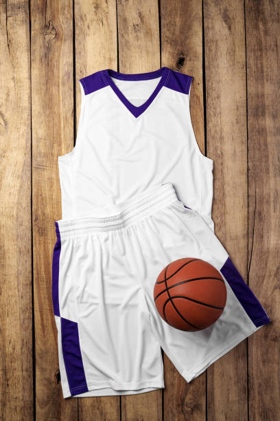 istock Basketball uniform on wooden background top view 2153922248
