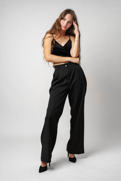 istock Woman in Black Top and Pants 2153922717