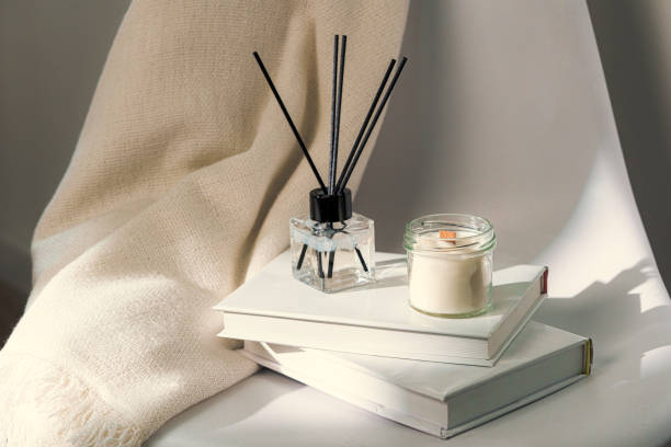 istock Aromatic candle in glass jar close up 2153925028