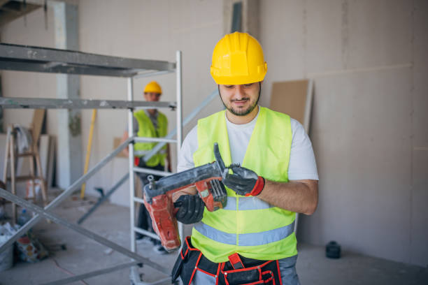istock Professionalism at Work: Construction Worker with Electric Nail Gun 2153926955