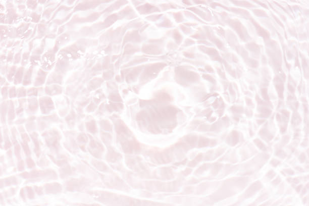 istock Blue water with ripples on the surface. Defocus blurred transparent blue colored clear calm water surface texture with splashes and bubbles. Water waves with shining pattern texture background. 2153927204