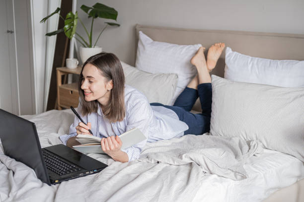 istock The girl works from home. Online work. Remote work 2153928410