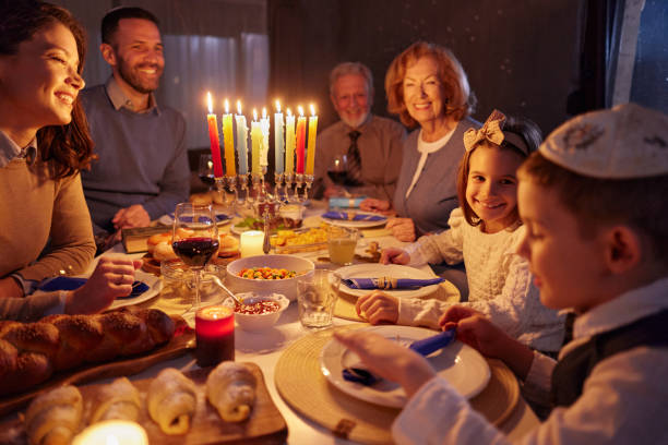 istock Happy extended family having dinner on Hanukkah. 2153929437