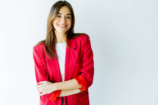istock Confident woman smiling in bright office space during daytime 2153929880