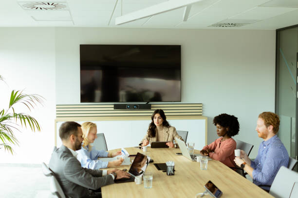 istock Diverse team engaging in strategic planning during bright daytime office meeting 2153930236