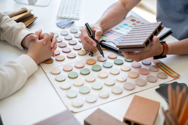 istock A close-up image of an expert interior designer or architect having a meeting with his client. 2153930652