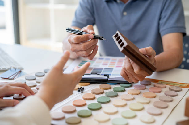 istock A close-up image of an expert interior designer or architect having a meeting with his client. 2153930658