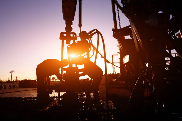 istock Oil drilling exploration, the oil workers are working 2153931281