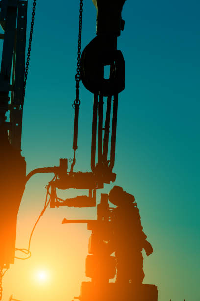 istock Oil drilling exploration, the oil workers are working 2153931284