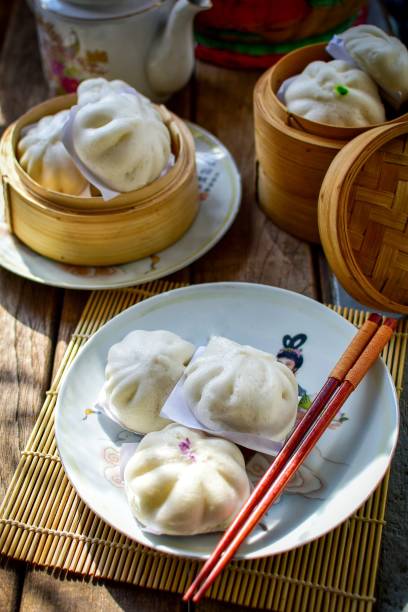 istock steamed stuff bun,steamed dumpling,stuffed steamed bun,thai called sarapao, morningnlight 2153931743