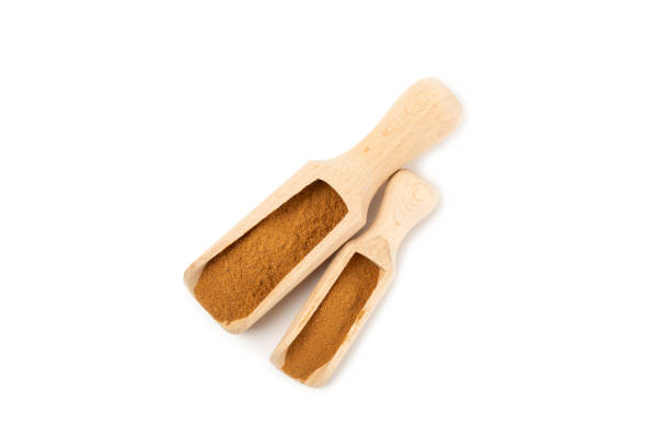 istock Cinnamon powder isolated on white background. Spicy spice for baking, desserts and drinks. Fragrant ground cinnamon. 2153932391