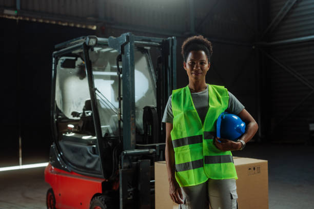 istock Customs warehouse female worker standing and smiling in the warehouse 2153933483