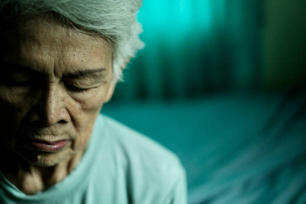 Portrait of an old woman and space on the side for text.