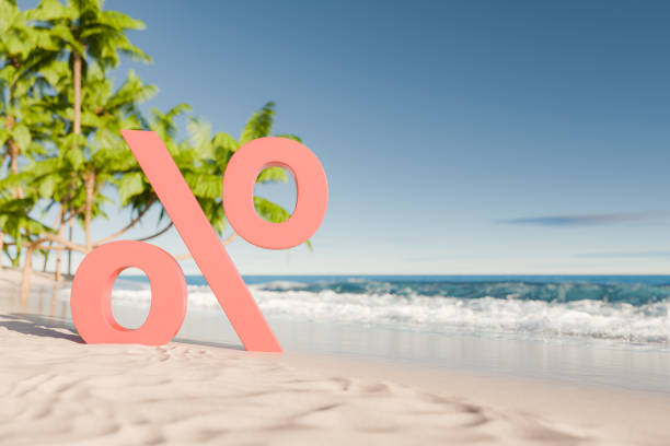 Percentage symbol on a tropical beach with palm trees and ocean