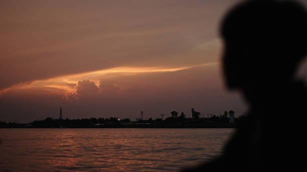Man solo traveling at riverside.