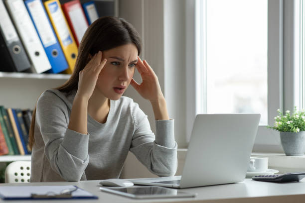 istock Frustrated woman cheking laptop after mistake 2153940896