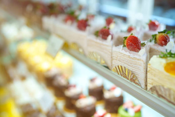 istock Cakes and desserts are attractively displayed in a refrigerator in a bakery store, showcasing a variety of delicious options. 2153944743