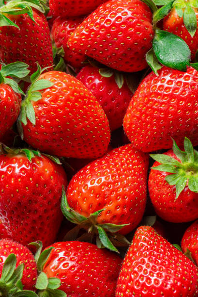 istock Red ripe strawberry harvest, top view 2153950352