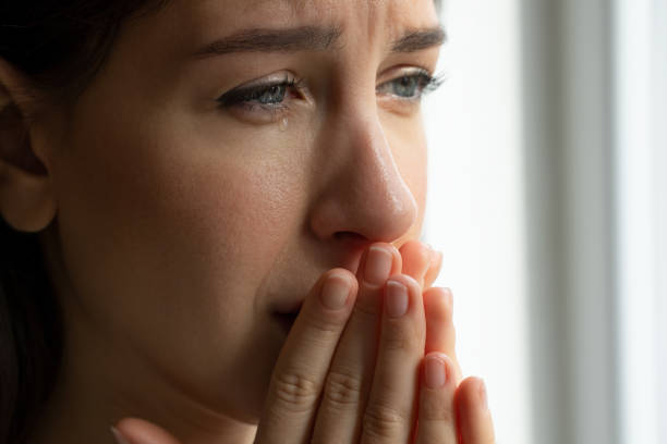 istock Young crying woman eyes with a tears 2153953642