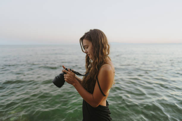 istock Female photographer 2153963523