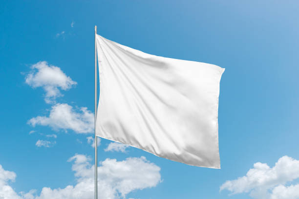 istock White flag mockup in the wind, perfect for national flag or design presentations and advertising with a clean, blank surface 2153968963