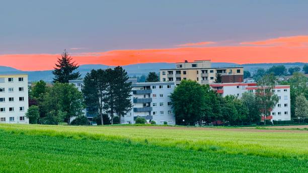 Sunset over the suburbs at agricultural fields