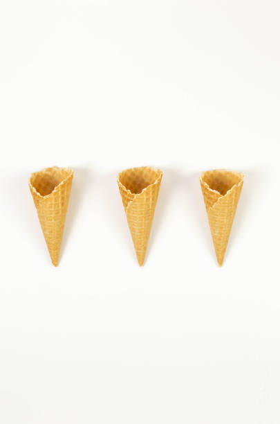 istock Top view of three ice cream waffle cones on white background. 2153971149