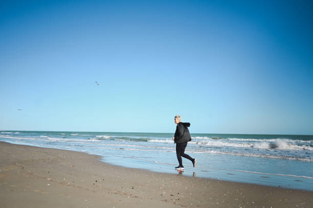 Sport in front of a seascape.