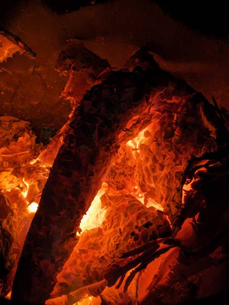 istock A close-up of glowing embers in a dark background. 2153973379