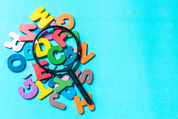 istock Magnifier placed on English letters 2153973483