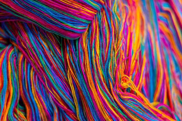 istock Skeins of traditional Guatemalan colorful threads, abstract, background texture. 2153980024